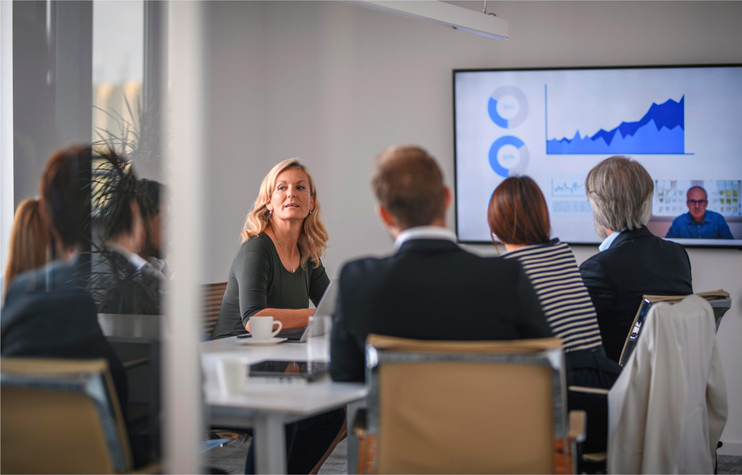 Group of people sitting in a board meeting